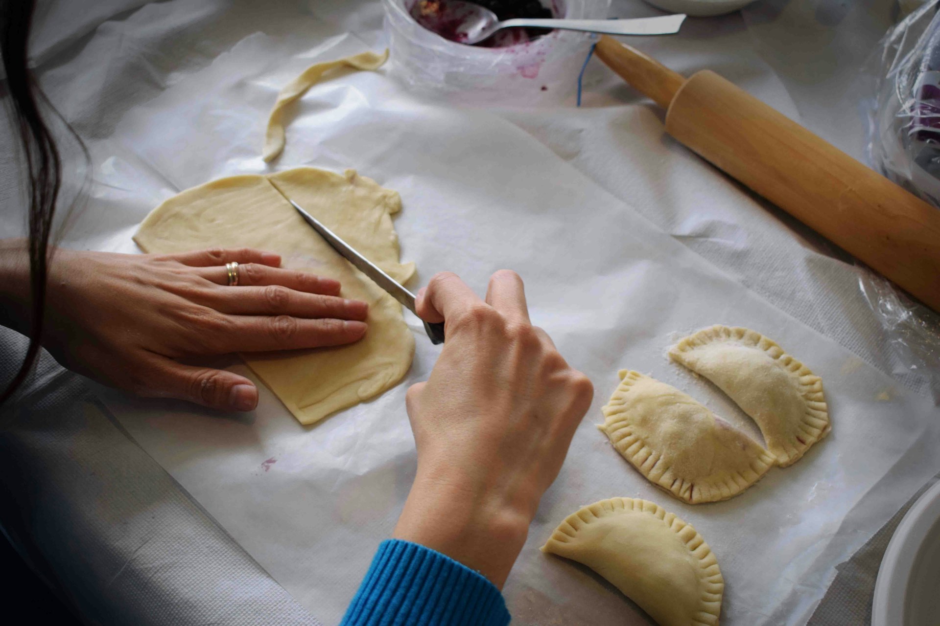 person making Empanadas